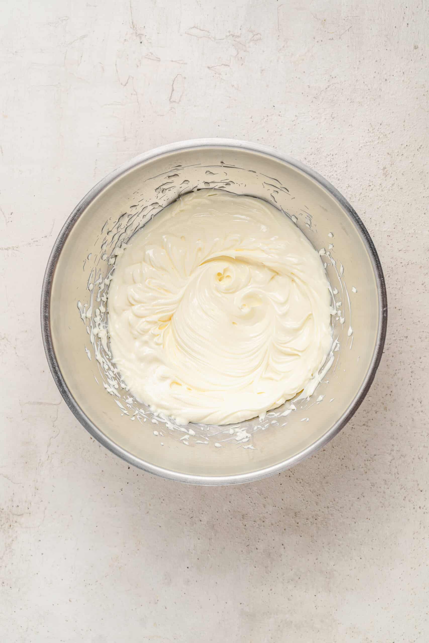 Beating butter until pale for the strawberry buttercream - Catherine Zhang Beating butter until pale for the strawberry buttercream