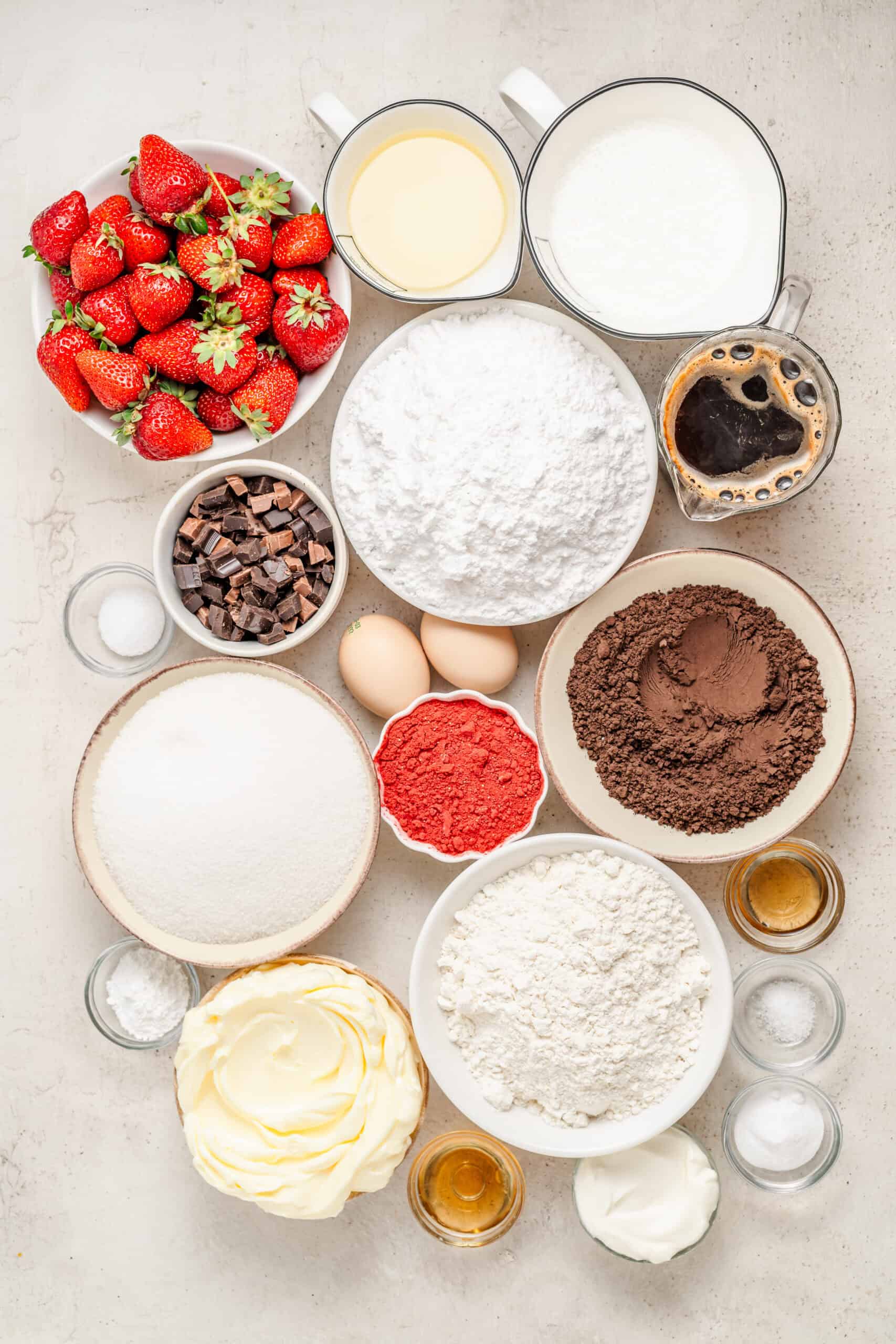 Ingredients for chocolate strawberry cake laid out on a counter - Catherine Zhang Ingredients for chocolate strawberry cake laid out on a counter