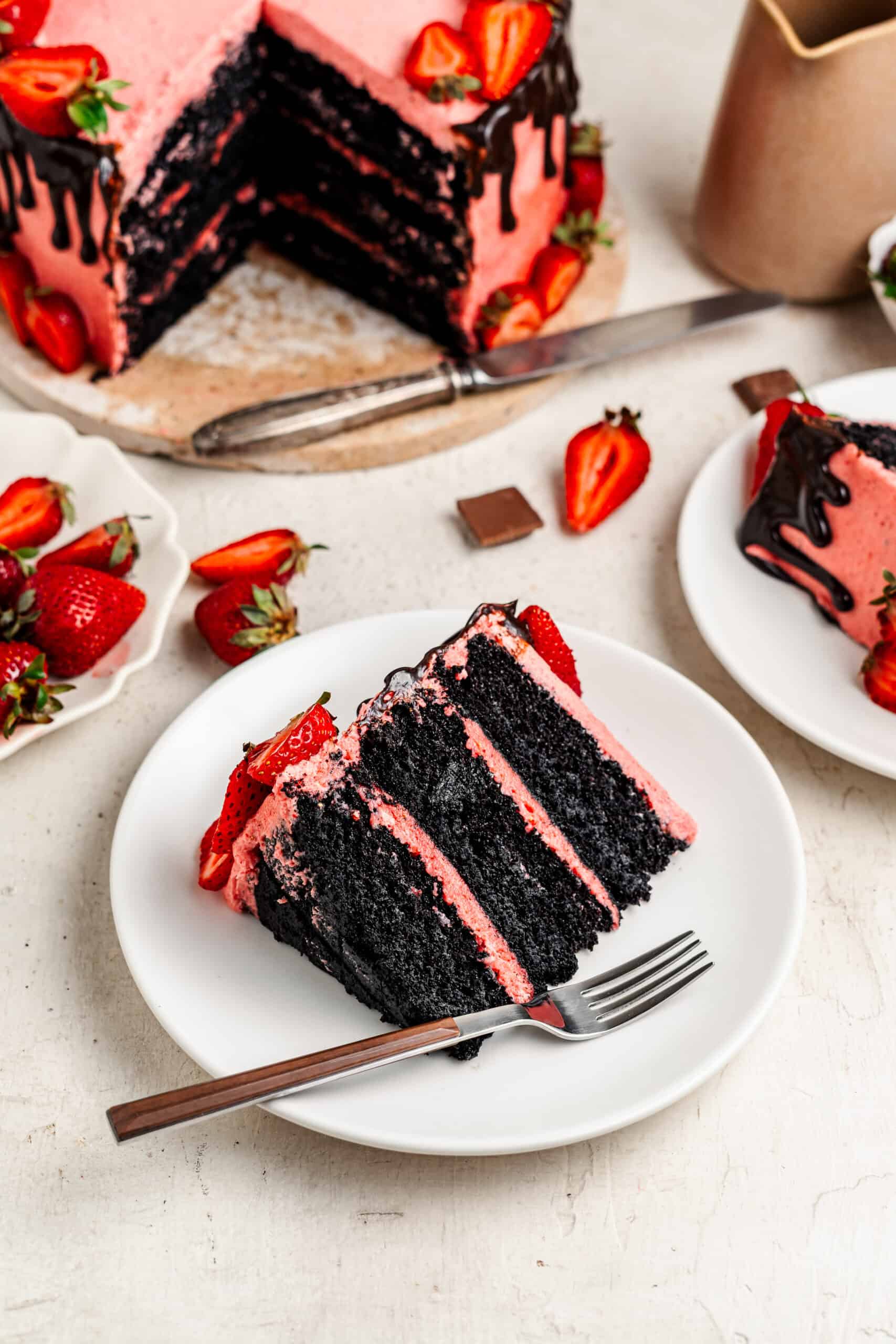Slice of chocolate strawberry cake on a white plate - Catherine Zhang Slice of chocolate strawberry cake on a white plate