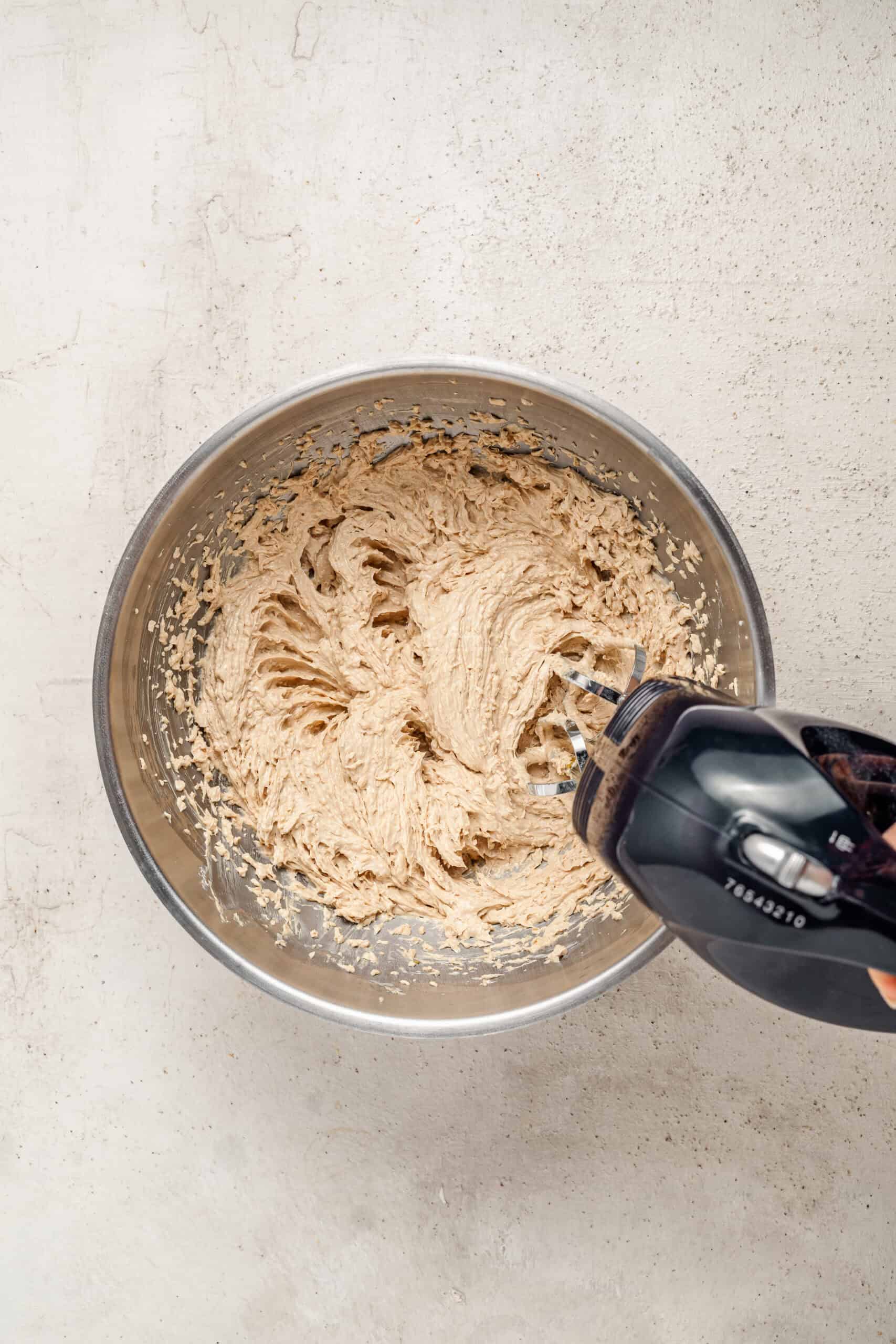 Gingerbread latte cookie dough coming together in a bowl - Catherine Zhang Gingerbread latte cookie dough coming together in a bowl
