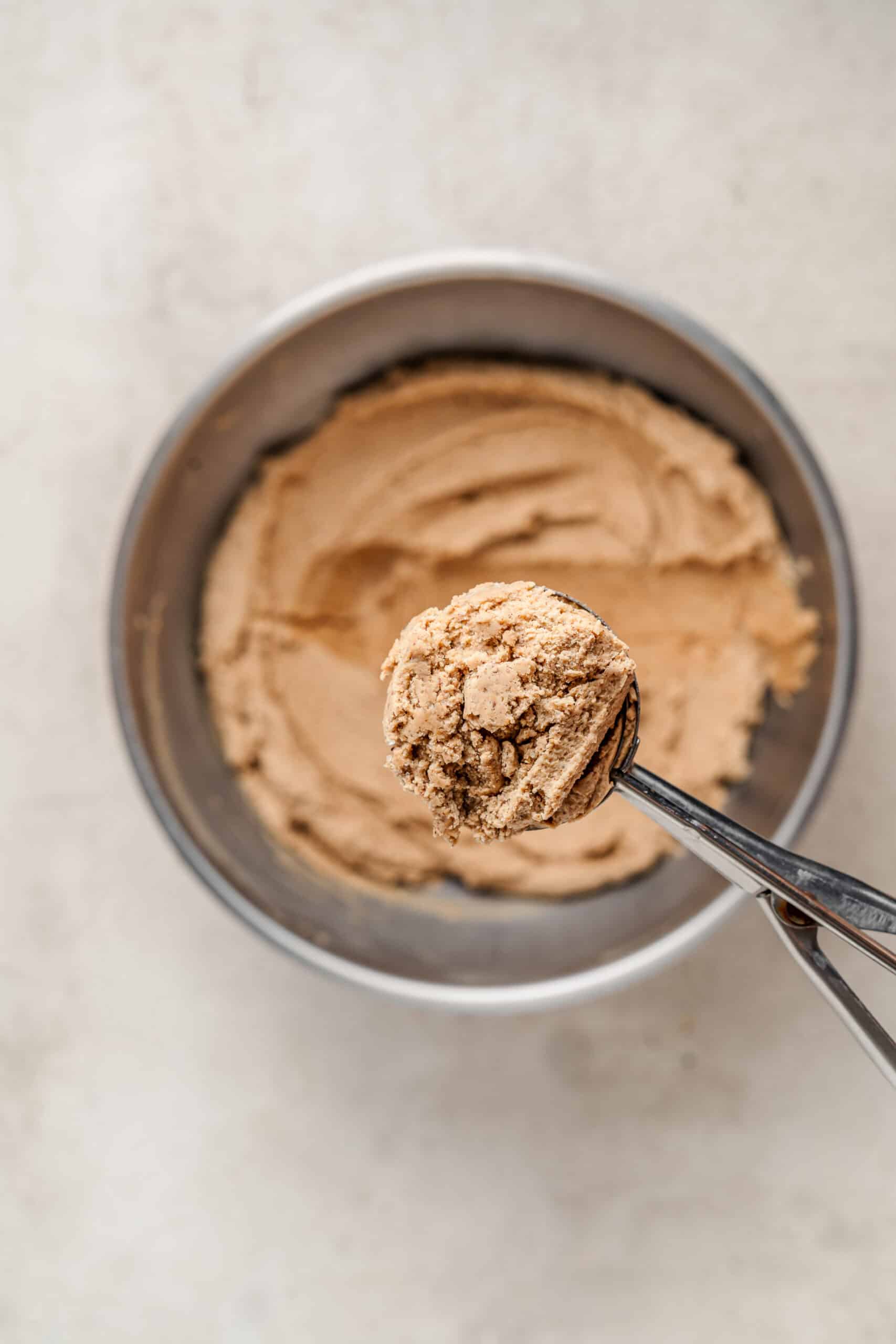 Scooping gingerbread latte cookie dough into balls - Catherine Zhang Scooping gingerbread latte cookie dough into balls