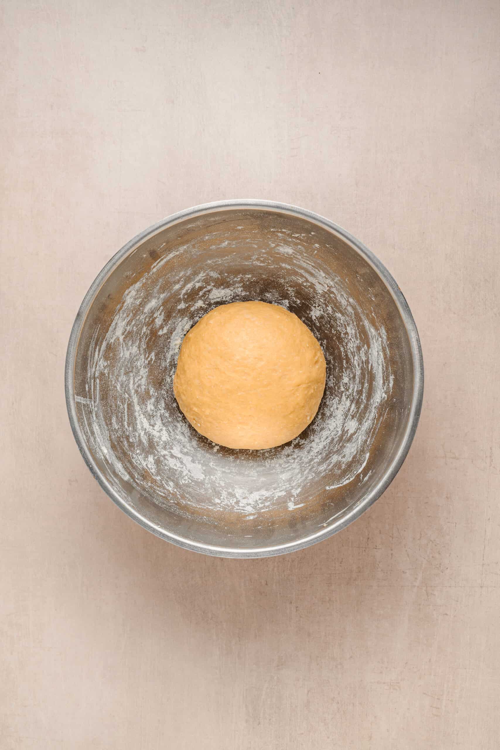 Sachima Egg Noodle Dough - Catherine Zhang Stiff egg noodle dough kneaded in a bowl for sachima