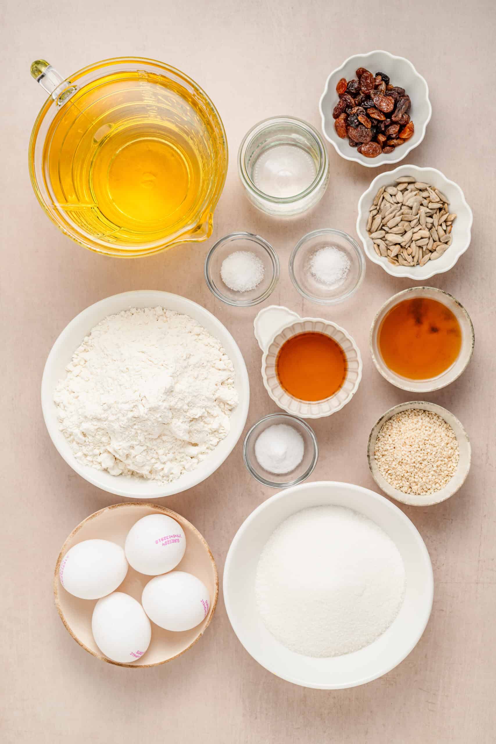 Sachima Ingredients - Catherine Zhang Sachima ingredients flat lay with cake flour, eggs, maltose, sugar, raisins and sesame seeds