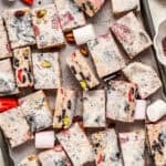 Snowflake crisp squares jeweled with strawberries, Oreos, biscuits and pistachios