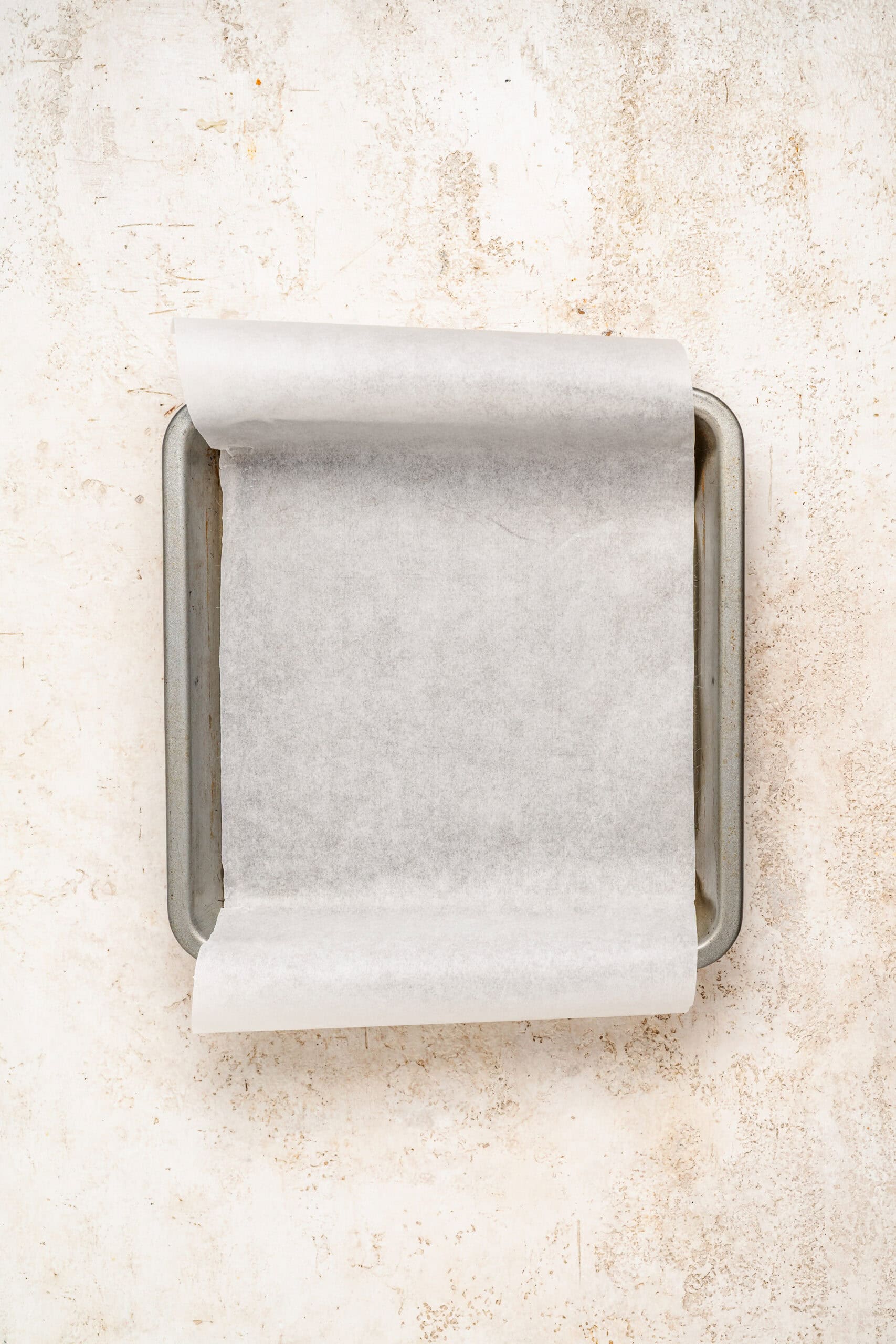 Parchment lined square pan for snowflake crisp - Catherine Zhang Parchment lined square pan for snowflake crisp