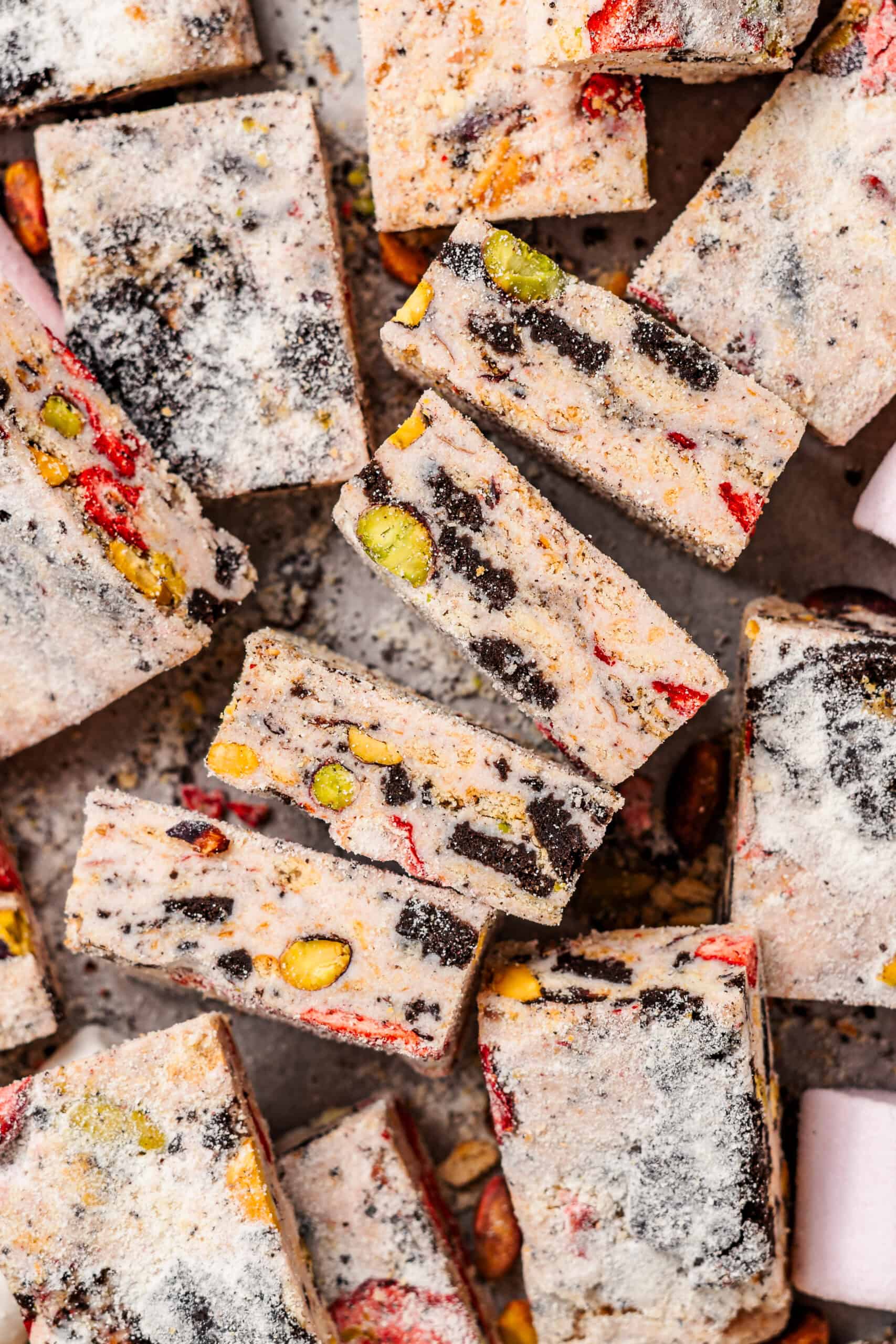 Pile of snowflake crisp squares with a milk powder dusting - Catherine Zhang Pile of snowflake crisp squares with a milk powder dusting
