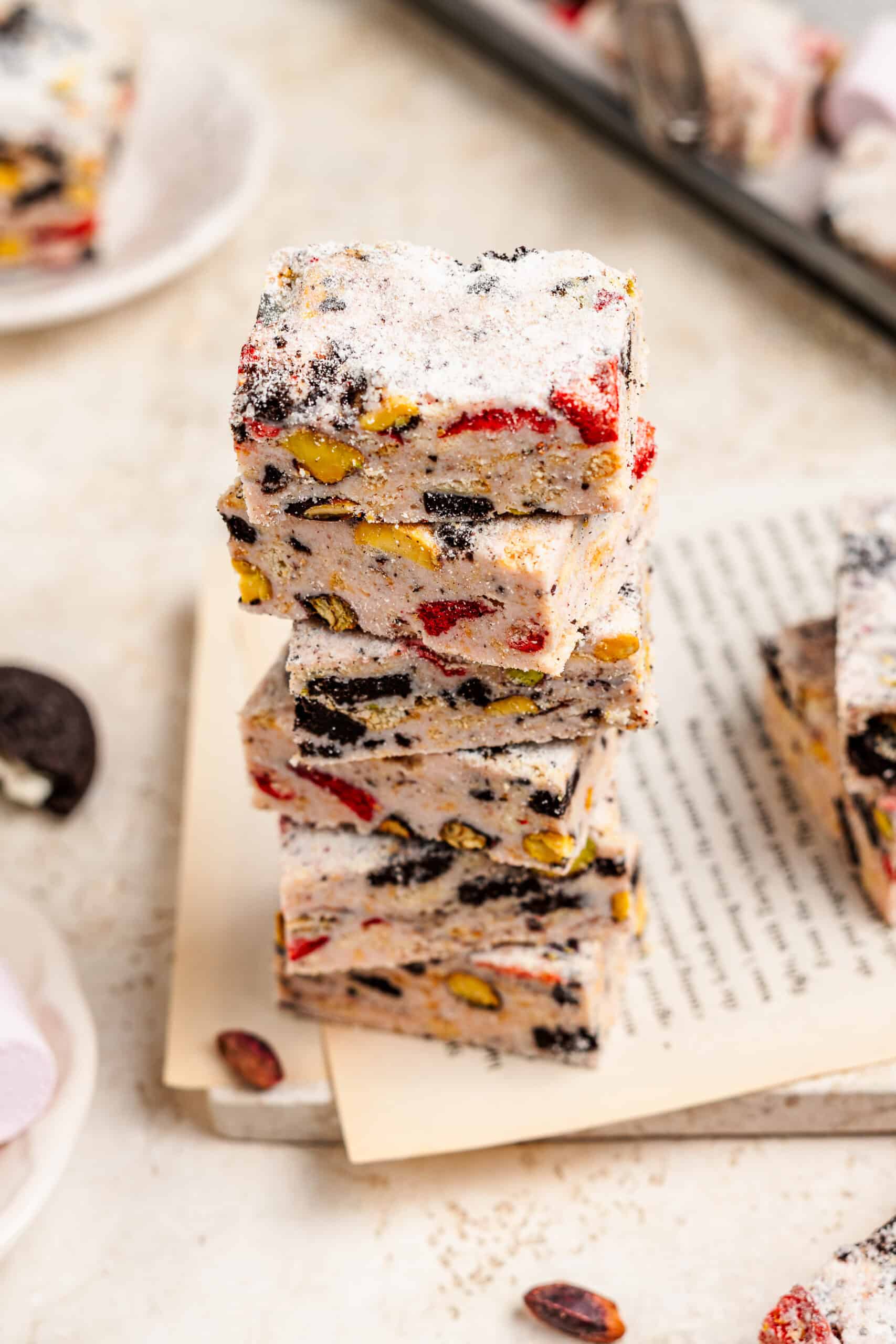 Snowflake crisp squares stacked on a wire rack - Catherine Zhang Snowflake crisp squares stacked on a wire rack