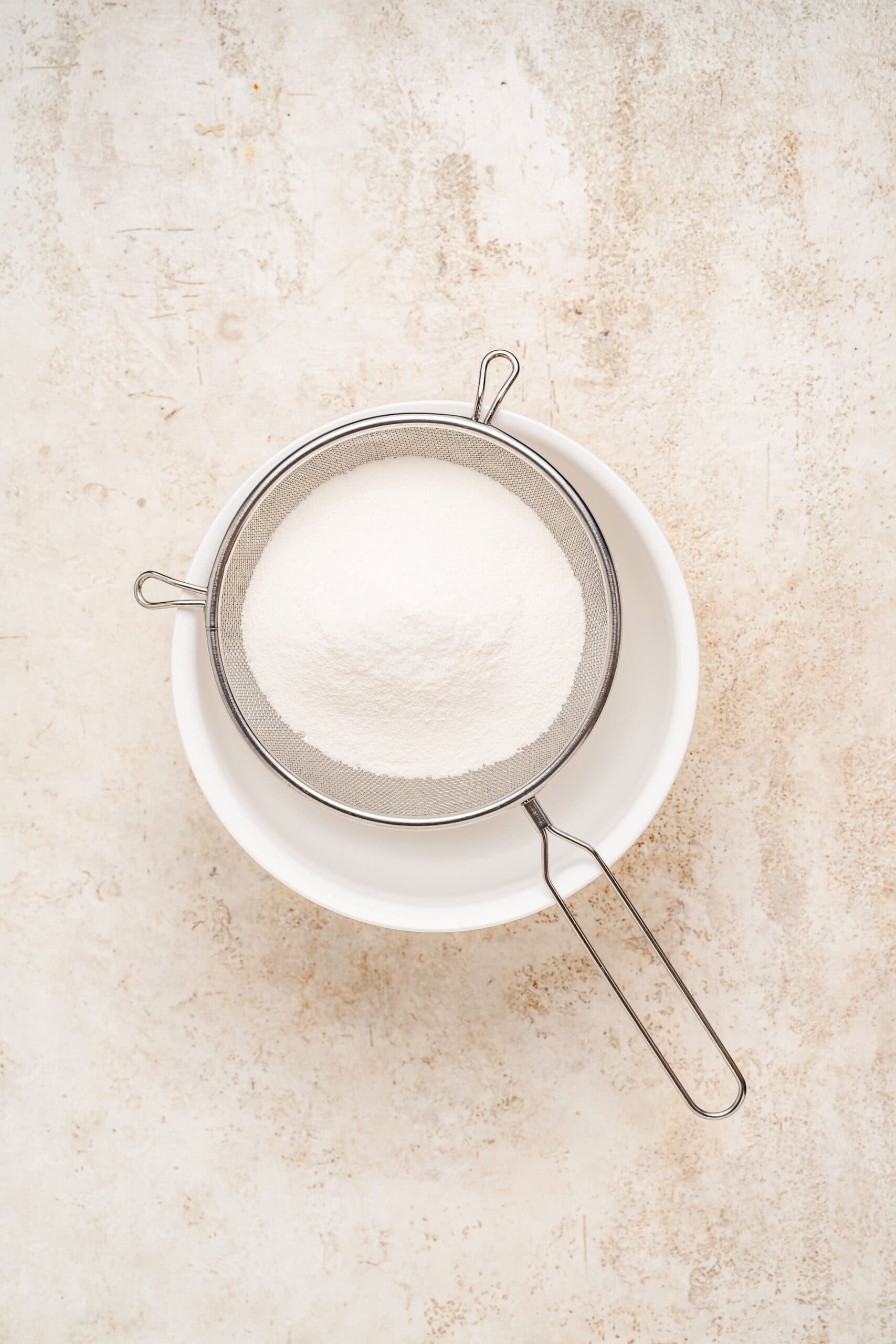 Sifting full fat milk powder and salt for snowflake crisp nougat - Catherine Zhang Sifting full fat milk powder and salt for snowflake crisp nougat