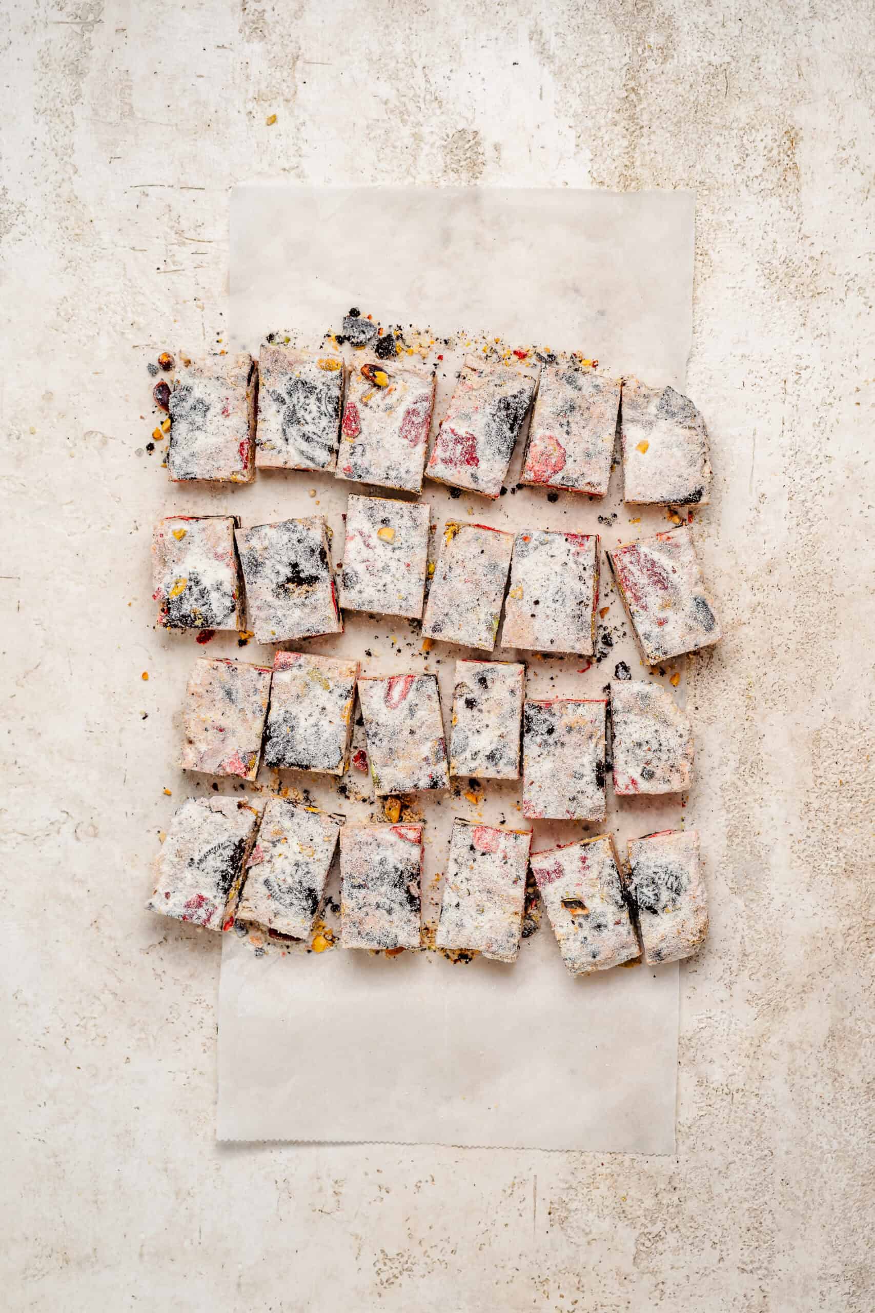 Sliced snowflake crisp squares showing the jeweled mix-ins - Catherine Zhang Sliced snowflake crisp squares showing the jeweled mix-ins