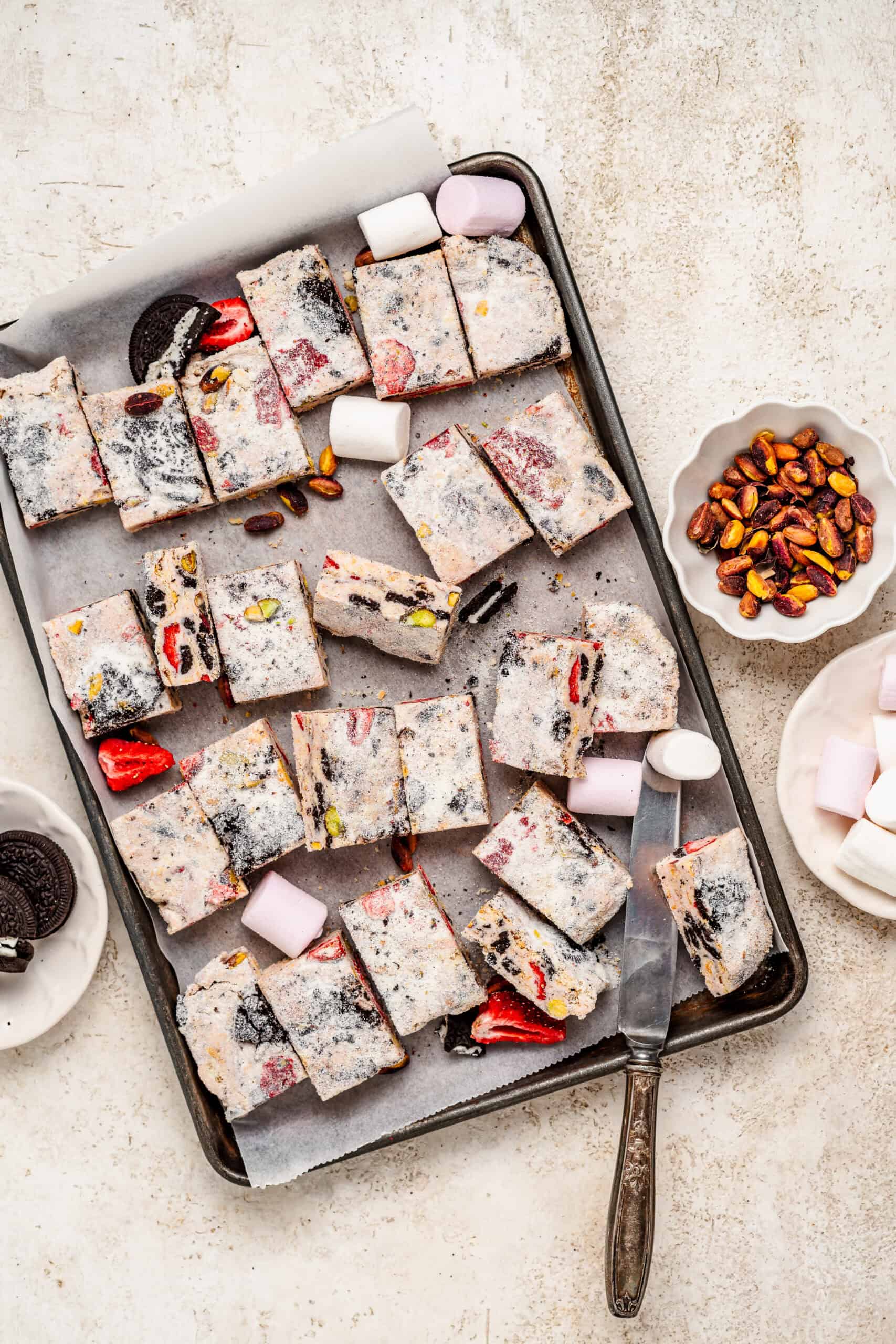 Snowflake crisp squares scattered on a tray - Catherine Zhang Snowflake crisp squares scattered on a tray