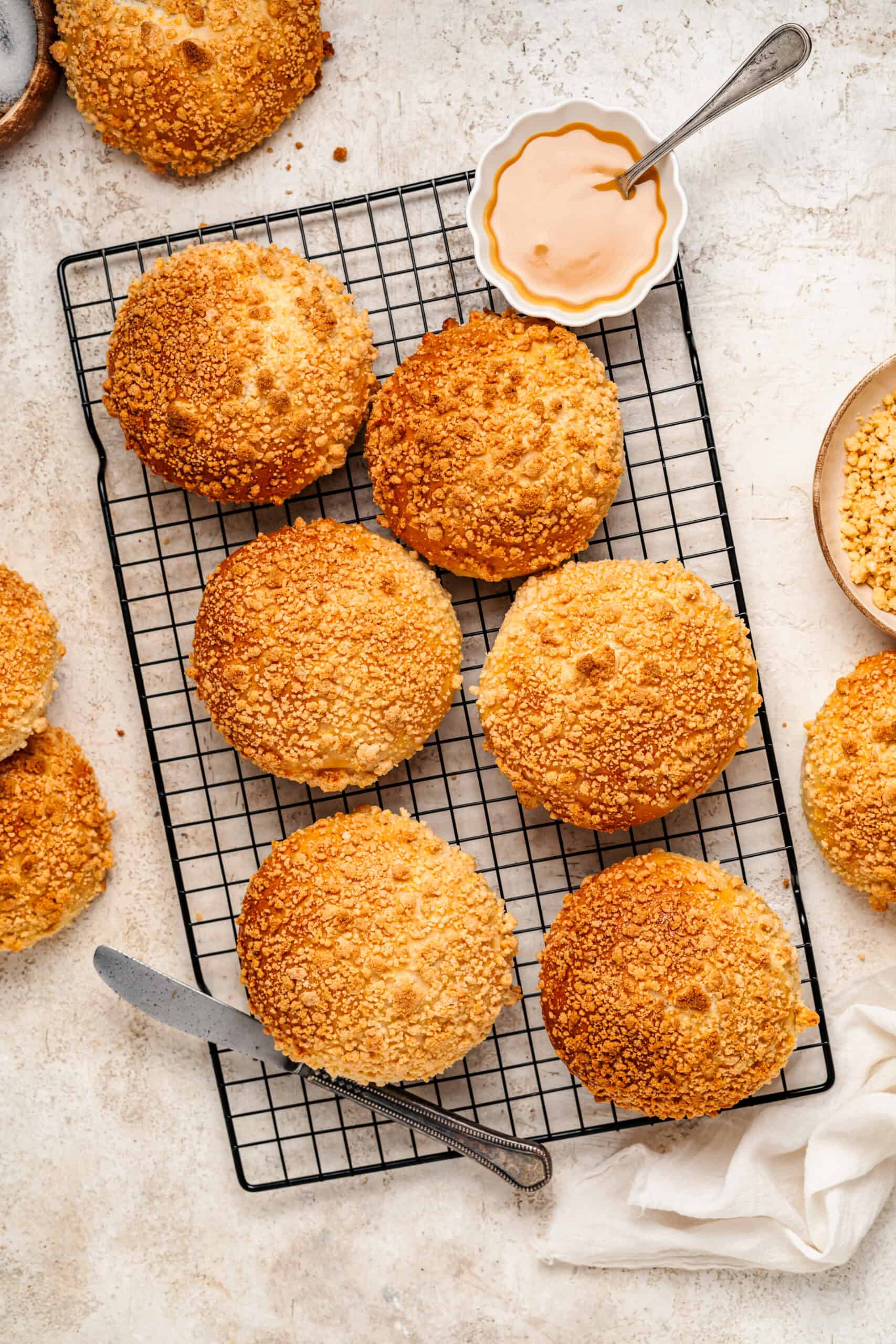 Soboro bread buns on a wire rack with crunchy peanut streusel topping - Catherine Zhang Soboro bread buns on a wire rack with crunchy peanut streusel topping