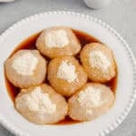Warabimochi, Japanese jiggly mochi, dusted with kinako and pooled in kuromitsu syrup