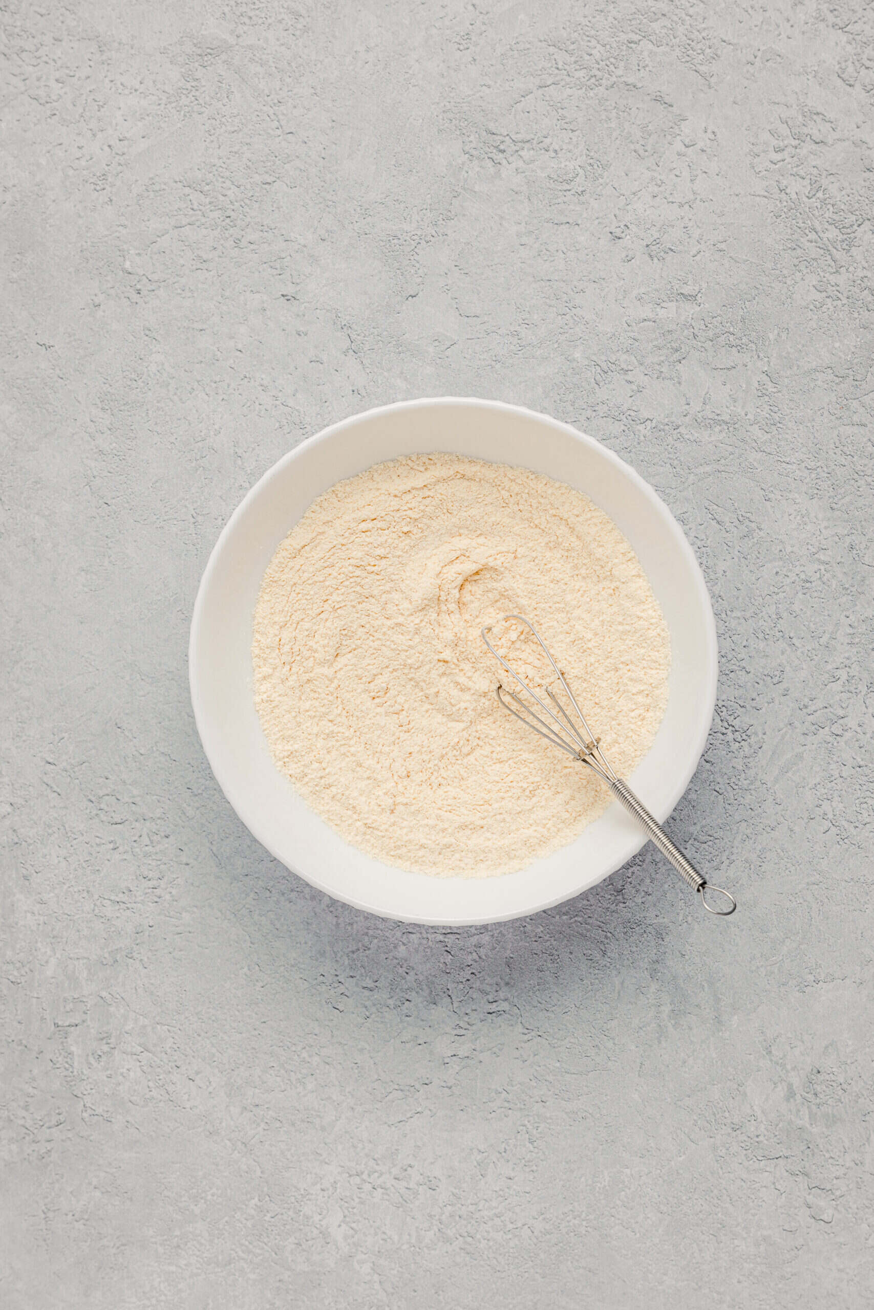 Kinako coating whisked smooth in a bowl ready for dusting warabimochi - Catherine Zhang Kinako coating whisked smooth in a bowl ready for dusting warabimochi