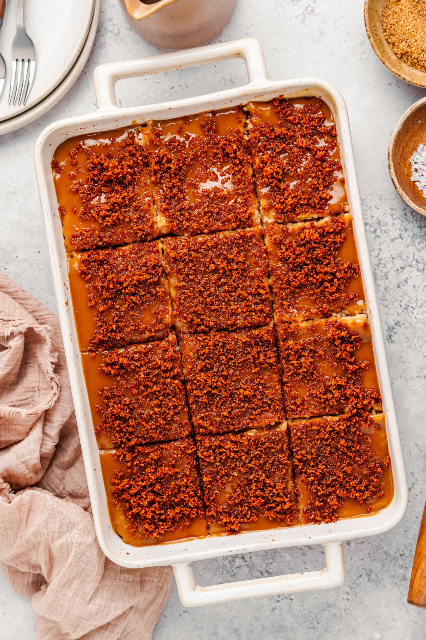 Overhead view of a full tray of Filipino biko scored into squares - Catherine Zhang Overhead view of a full tray of Filipino biko scored into squares