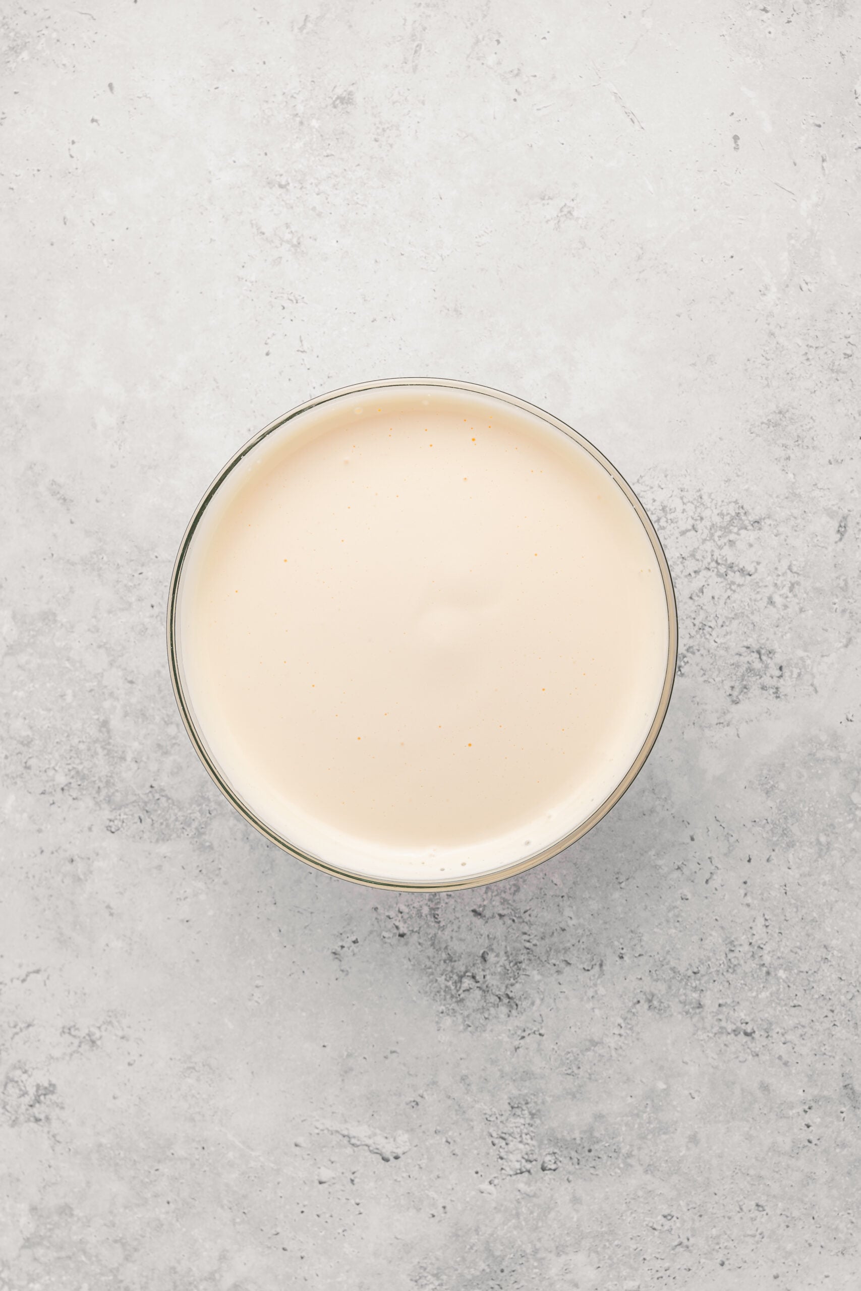 Thick pale tripled egg foam at the ribbon stage for Japanese castella cake - Catherine Zhang Thick pale tripled egg foam at the ribbon stage for Japanese castella cake
