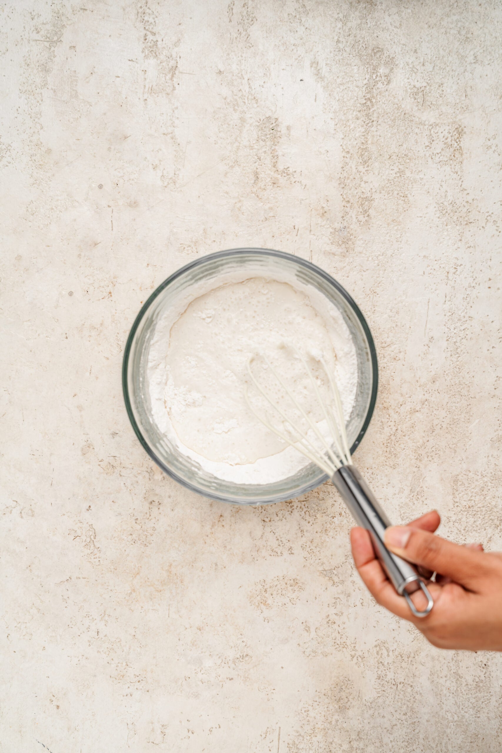 Whisking the red bean mochi batter until it is completely smooth - Catherine Zhang Whisking the red bean mochi batter until it is completely smooth
