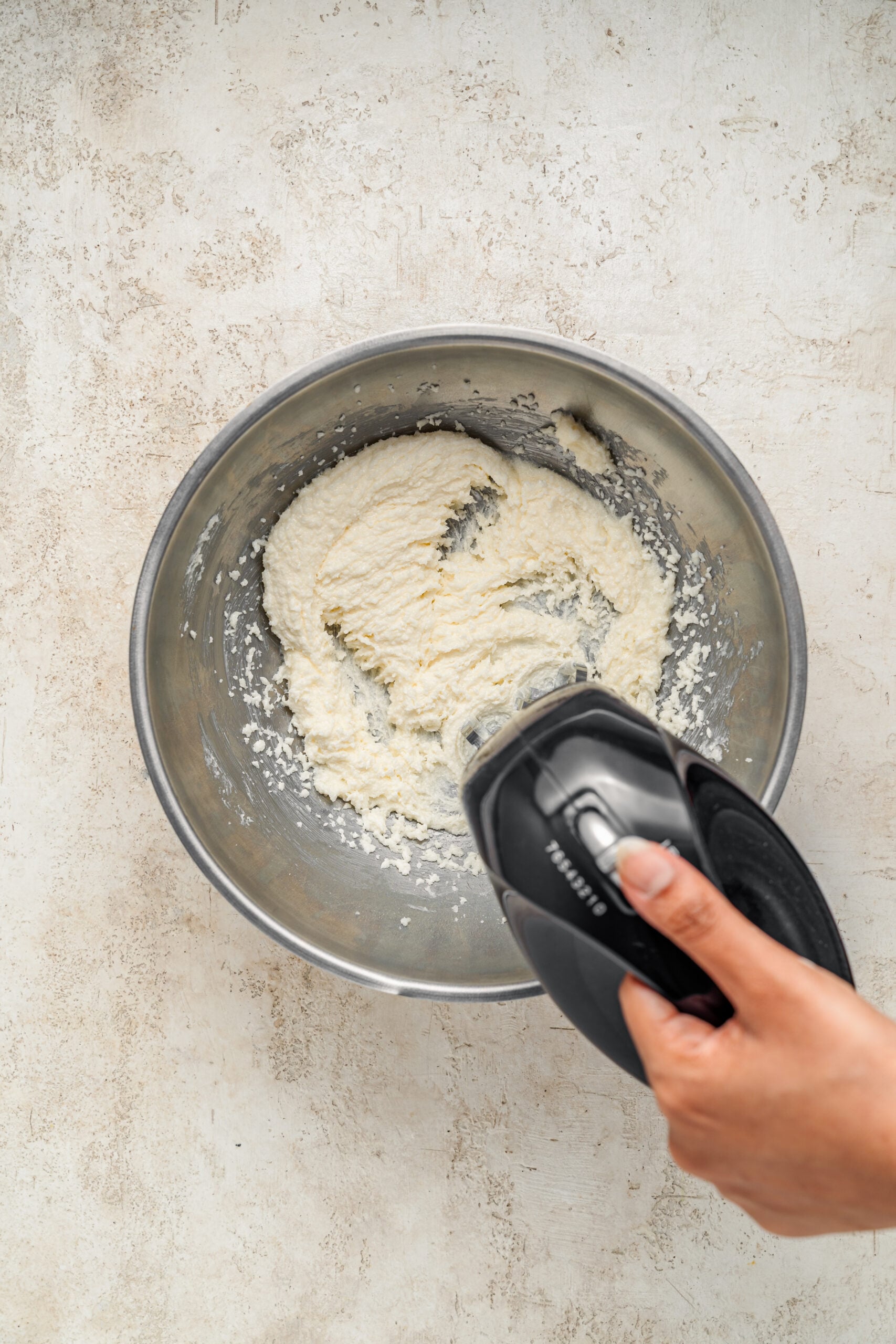 Chinese Almond Cookies - Catherine Zhang Creaming butter and sugar with a hand mixer for Chinese almond cookies