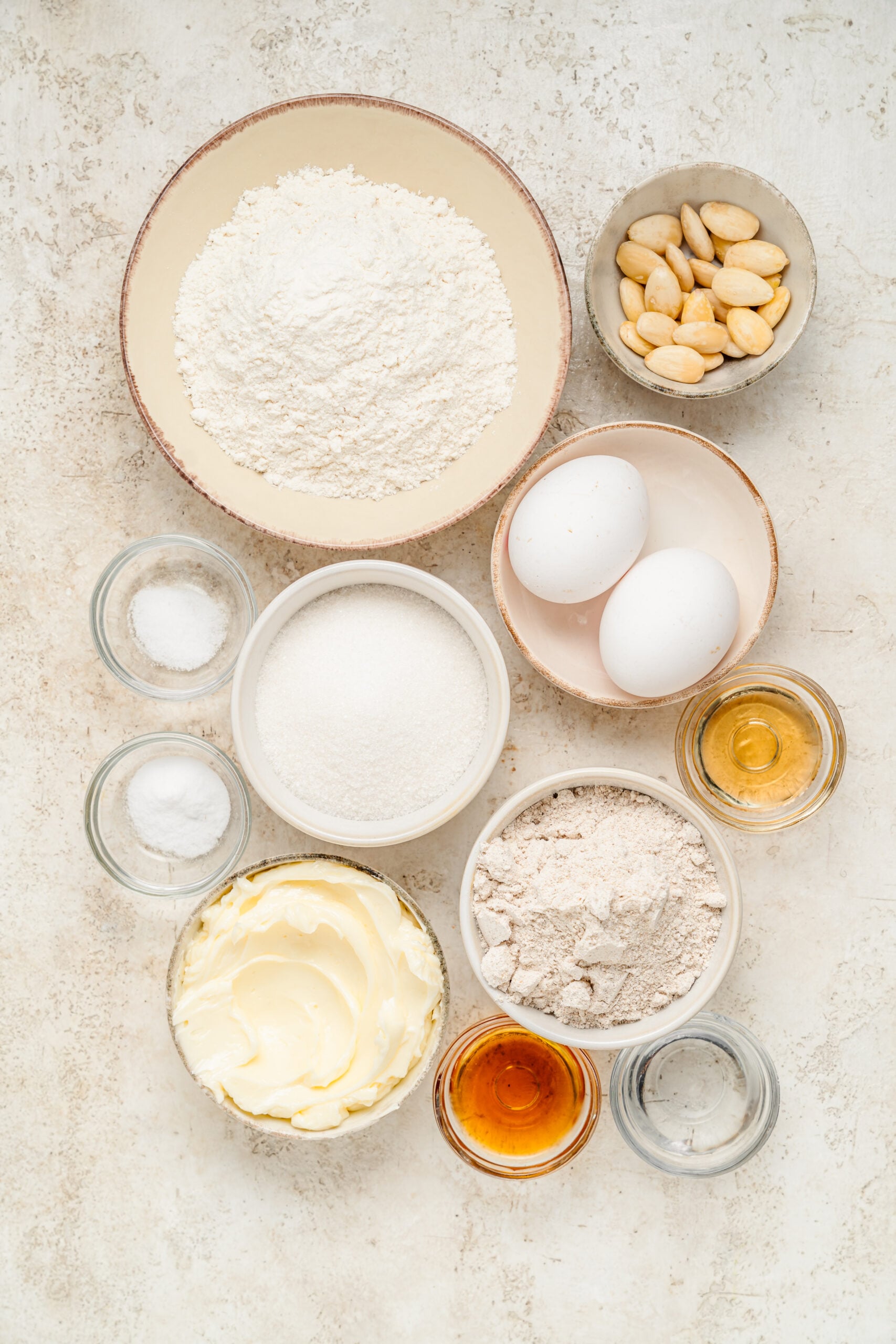 Chinese Almond Cookies - Catherine Zhang Ingredients for Chinese almond cookies: flour, almond meal, butter, sugar, eggs, whole almonds and almond extract