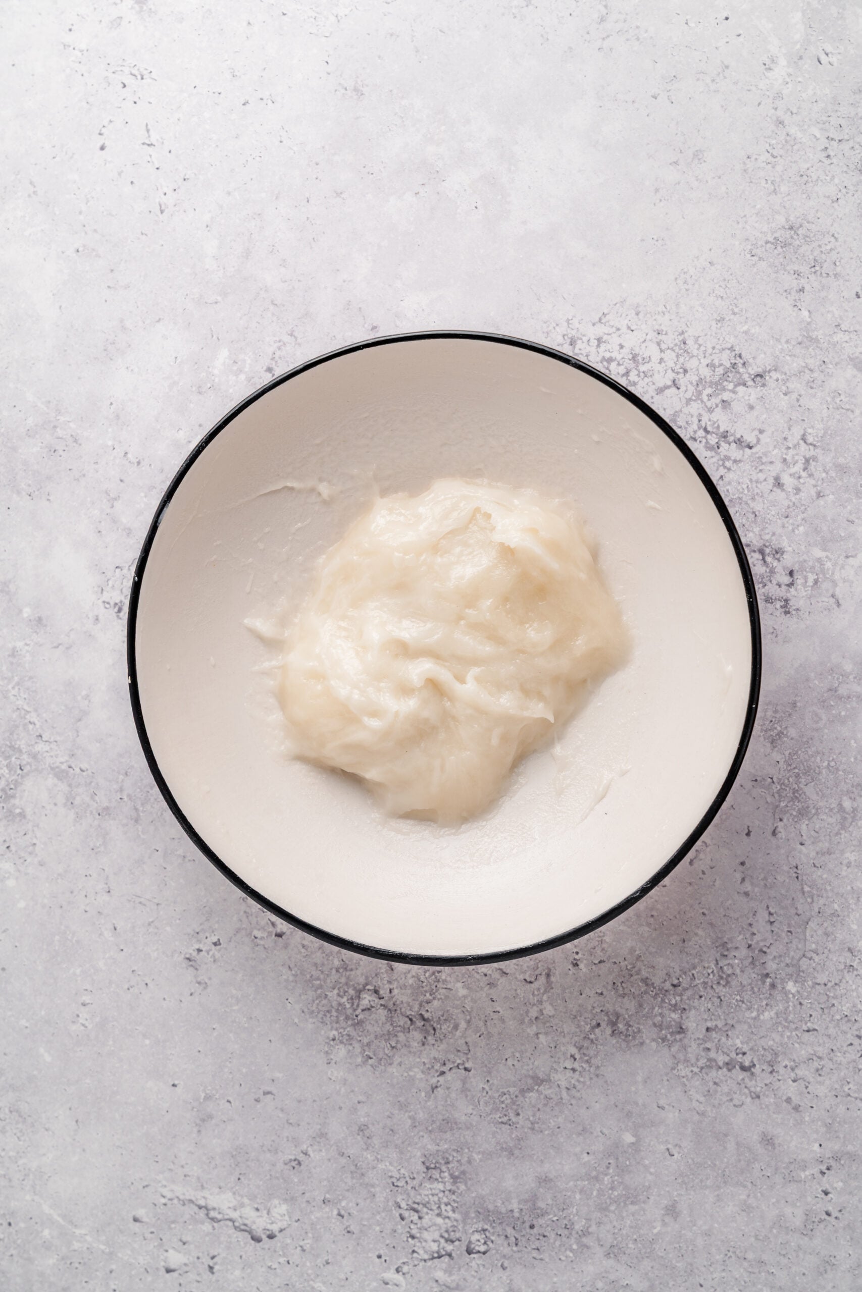 Cooked mochi dough - Catherine Zhang Cooked mochi dough looking thick, glossy and translucent in a bowl