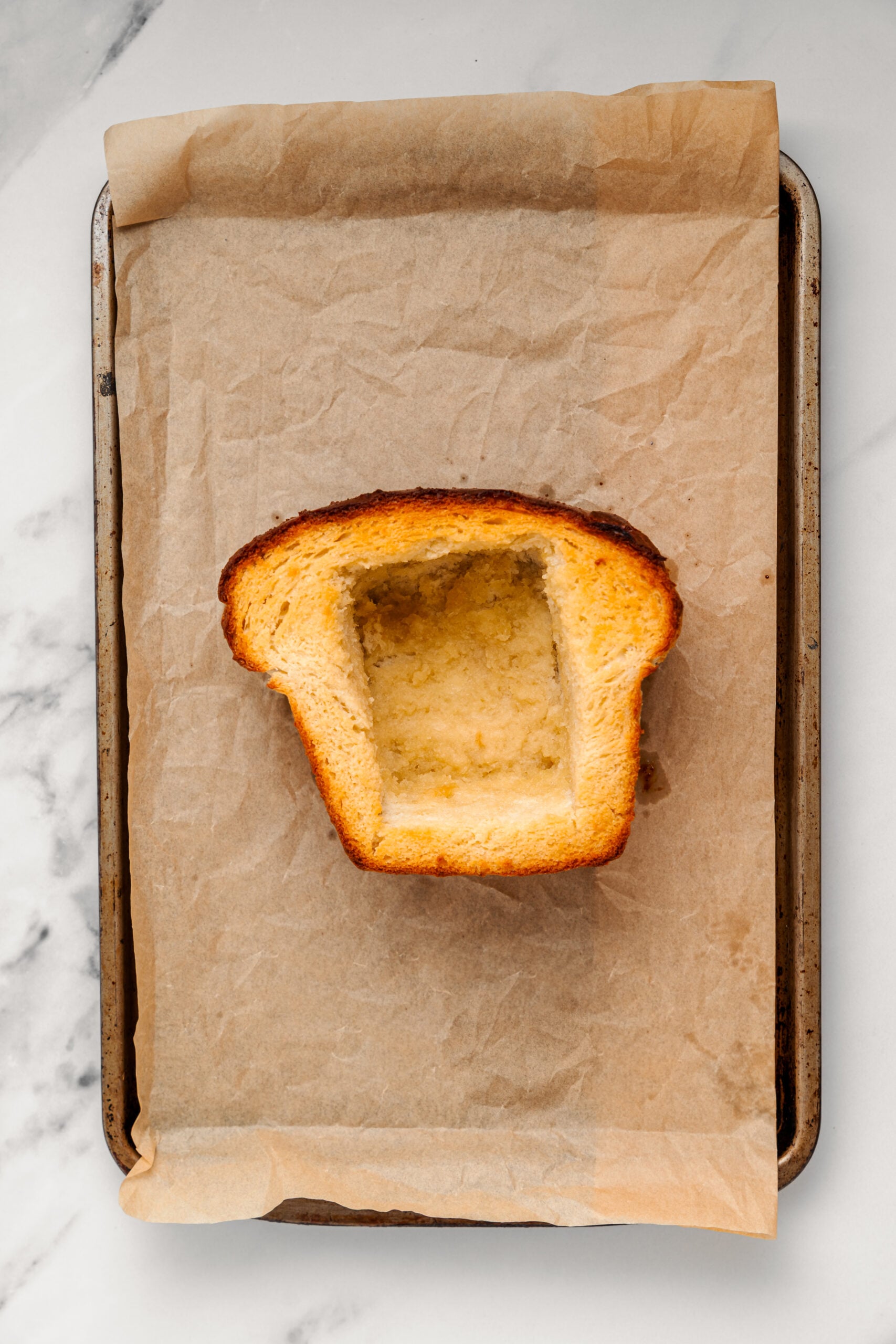 Shibuya Honey Toast - Catherine Zhang Honey toast bread box baked golden on the tray