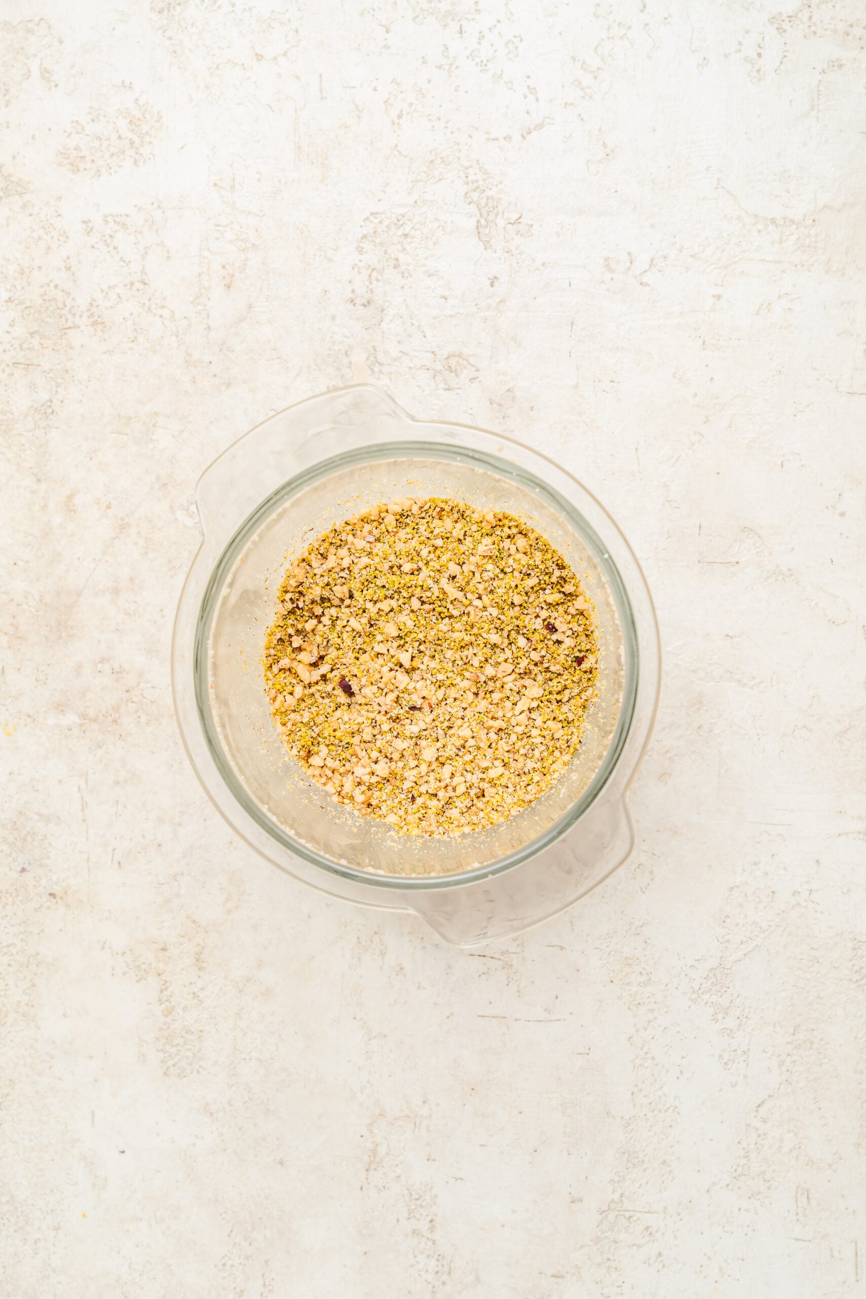 Pistachios and walnuts pulsed for baklava filling - Catherine Zhang Pistachios and walnuts pulsed to coarse crumbs in a glass food processor bowl