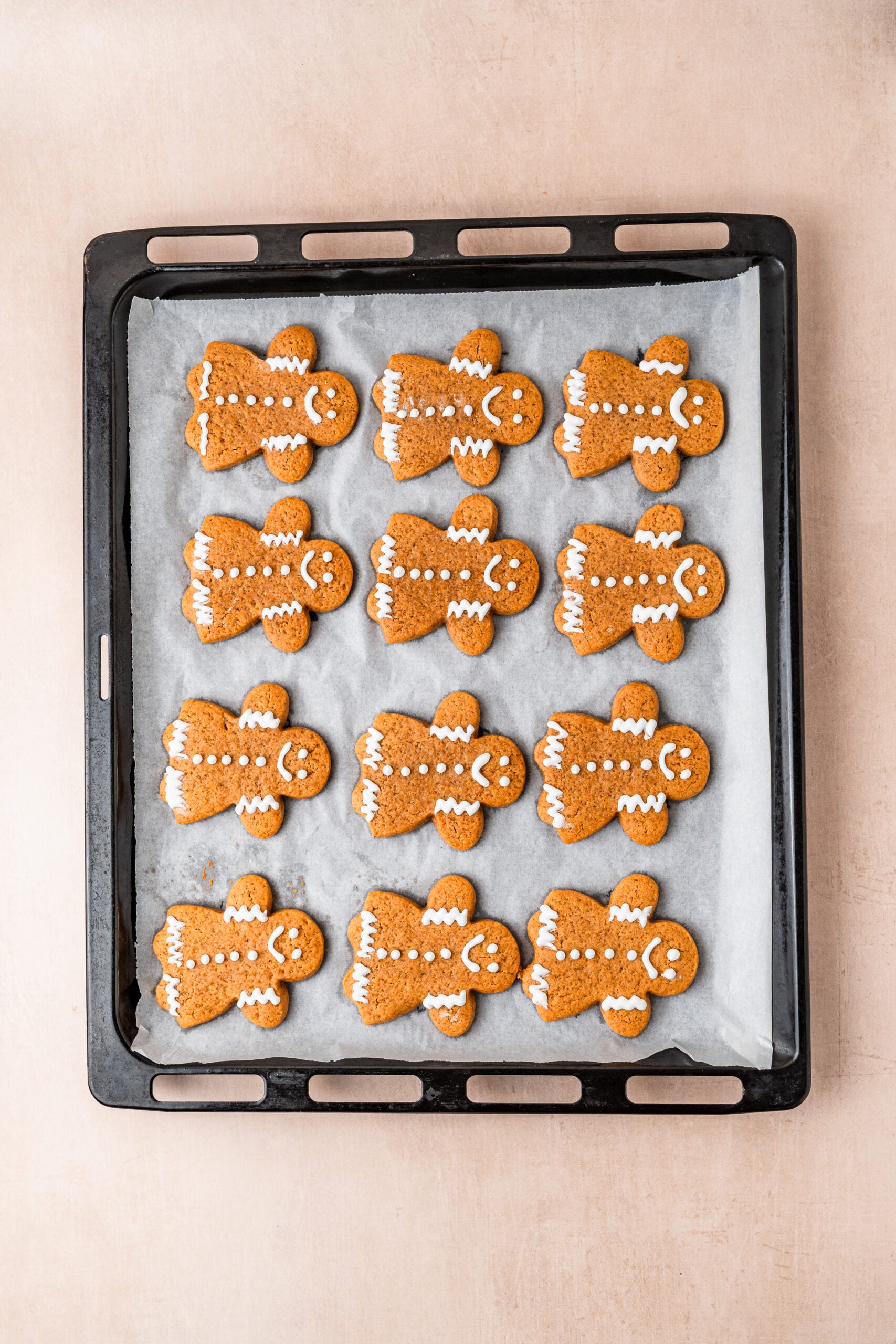 gingerbread-cookies-decorated-tray - Catherine Zhang A tray of gingerbread cookies decorated with simple white royal icing piping