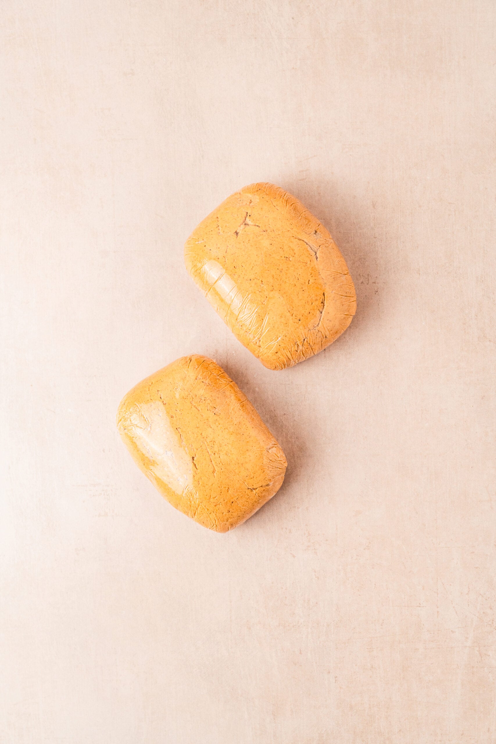 gingerbread-cookies-dough-discs - Catherine Zhang Gingerbread cookie dough divided into two flat discs ready to chill