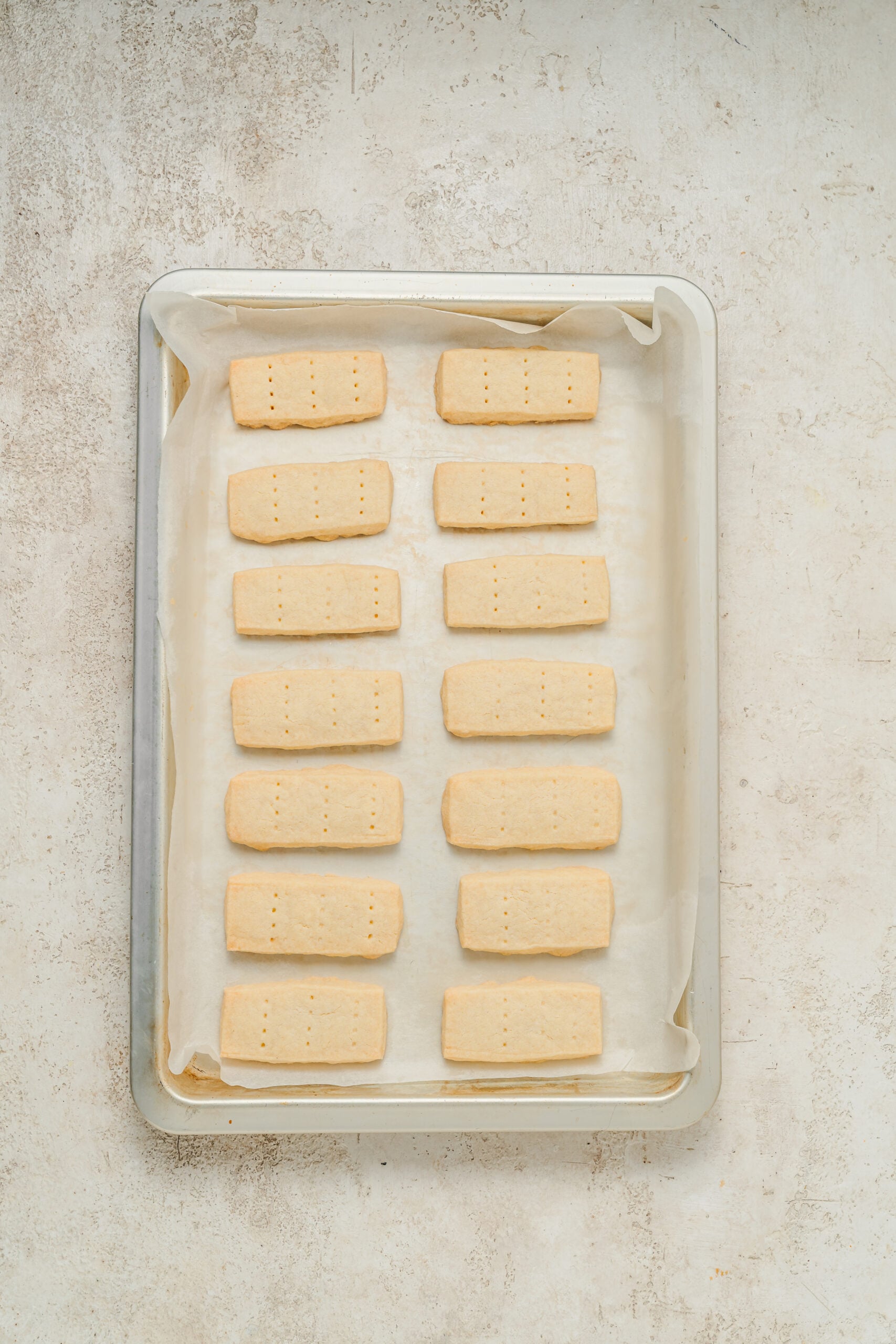 Baked shortbread cookies, pale and matte on top, on the baking tray - Catherine Zhang Baked shortbread cookies, pale and matte on top, on the baking tray