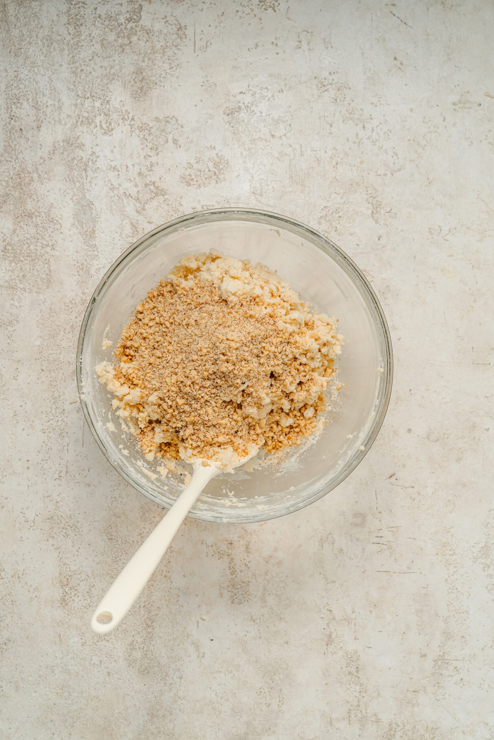 Chopped pecans mixed evenly through the snowball cookie dough - Catherine Zhang Chopped pecans mixed evenly through the snowball cookie dough