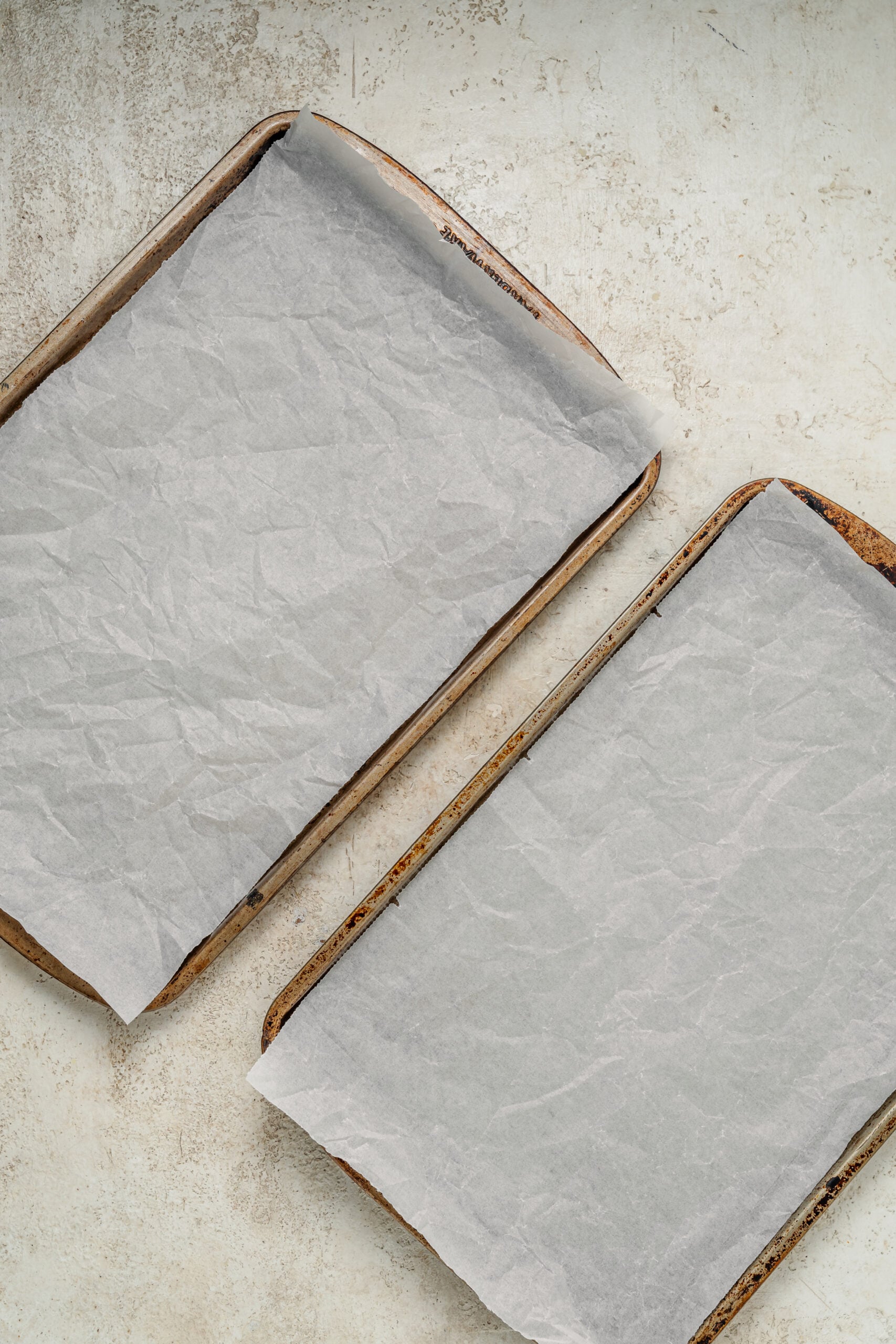 Two baking trays lined with baking paper - Catherine Zhang Two baking trays lined with baking paper